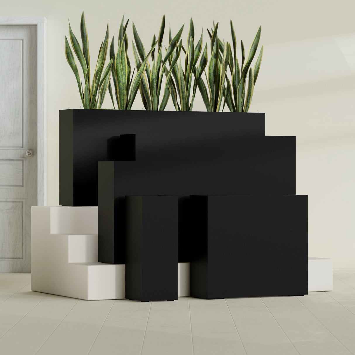 Delray Corner fiberglass planter in Matte Black, size range, in a sunlit interior