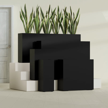 Delray Rectangular fiberglass planter in Matte Black, size range, in a sunlit interior