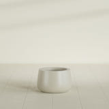 Short Hayden Bowl Planter in Satin Beige, 12"D × 7"H, shown empty