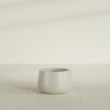 Short Hayden Bowl Planter in Satin Beige, 12"D × 7"H, shown empty