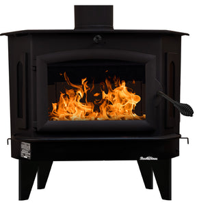 Buck Stove Bay Series Model 91 Catalytic Stove with bright orange flames visible through the large glass door and sturdy black frame