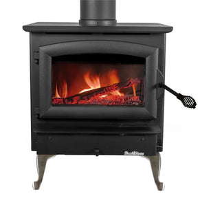 Buck Stove Model 21 Non-Catalytic Wood Stove showing warm glowing fire behind a clear glass door in classic black design