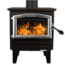Buck Stove Model 21 Non-Catalytic Wood Stove with silver frame and bright roaring fire seen through glass door