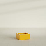 Antwerp corner fiberglass planter in Gloss Saffron