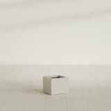 Cuba corner fiberglass planter in Matte Cement Grey (shown in Satin Beige; colour approximate)
