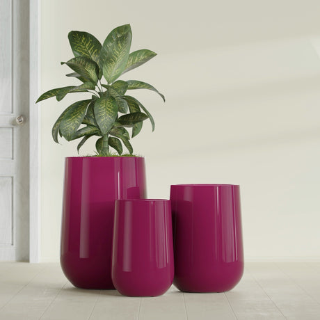 Hayden Urn fiberglass planter in Gloss Eggplant, size range, in a sunlit interior
