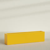 Miami Narrow Rectangular Planter in Gloss Saffron, 72"L × 12"D × 18"H, shown empty