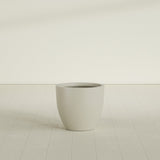 Wannsee Round Planter in Satin Beige, 27"D × 24"H, shown empty