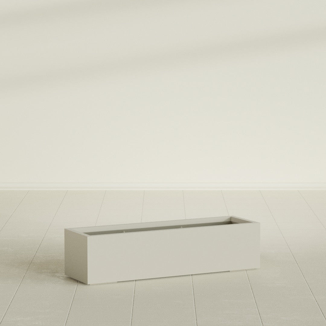 Cuba Low Rectangular Planter in Satin Beige, 48"L × 14"D × 12"H, shown empty
