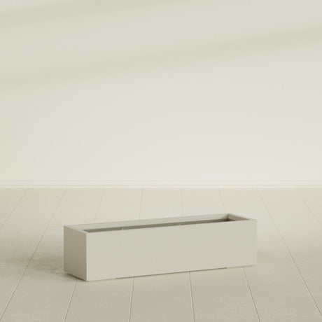 Cuba Low Rectangular Planter in Satin Beige, 48"L × 14"D × 12"H, shown empty