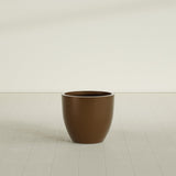 Wannsee Round Planter in Metallic Bronze, 27"D × 24"H, shown empty
