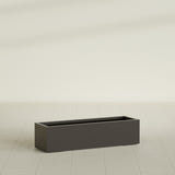 Cuba Low Rectangular Planter in Matte Dark Brown, 48"L × 14"D × 12"H, shown empty