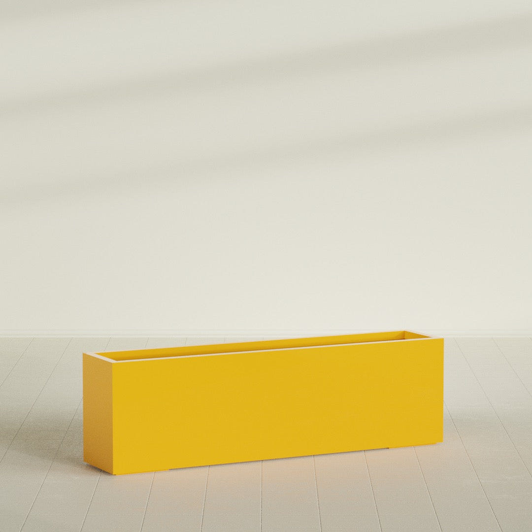 Miami Narrow Rectangular Planter in Gloss Saffron, 60"L × 12"D × 18"H, shown empty