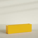 Miami Narrow Rectangular Planter in Gloss Saffron, 60"L × 12"D × 18"H, shown empty