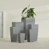 Toulan Tapered Square fiberglass planter in Matte Gunmetal, size range, in a sunlit interior