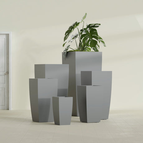 Toulan Tapered Square fiberglass planter in Matte Gunmetal, size range, in a sunlit interior