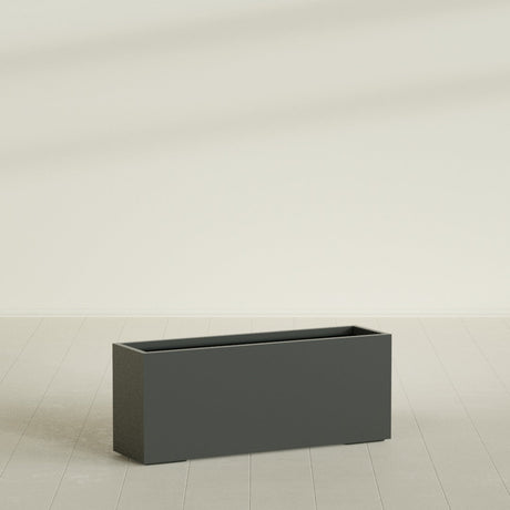 Tolga Rectangular Planter in Matte Charcoal, 60"L × 16"D × 24"H, shown empty
