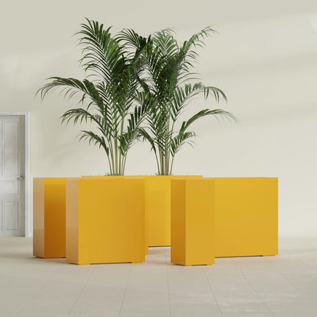 Perth Corner fiberglass planter in Gloss Saffron, size range, in a sunlit interior