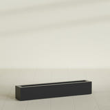 Salon Box Planter in Matte Black, 48" Long, shown empty