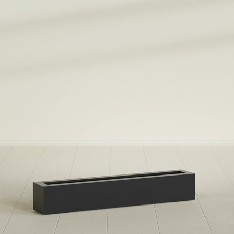 Salon Box Planter in Matte Black, 48" Long, shown empty