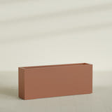 Hollywood Narrow Rectangular Planter in Matte Terra Cotta, 60"L × 12"D × 24"H, shown empty