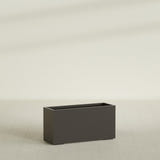 Tolga Rectangular Planter in Matte Dark Brown, 48"L × 16"D × 24"H, shown empty