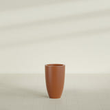 Brannan Tapered Round Planter in Matte Terra Cotta, 18"D × 29"H, shown empty