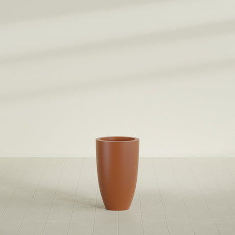 Brannan Tapered Round Planter in Matte Terra Cotta, 18"D × 29"H, shown empty