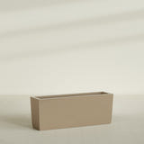 Panama Tapered Rectangular Planter in Gloss Metallic Gold, 48"L × 12"D × 18"H, shown empty