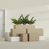 Tolga Rectangular fiberglass planter in Gloss Metallic Gold, size range, in a sunlit interior