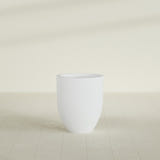 Valencia Tapered Round Planter in Gloss Bright White, 20"D × 23"H, shown empty