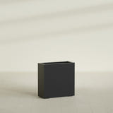 Milano Narrow Rectangular Planter in Matte Black, 24"L × 10"D × 24"H, shown empty