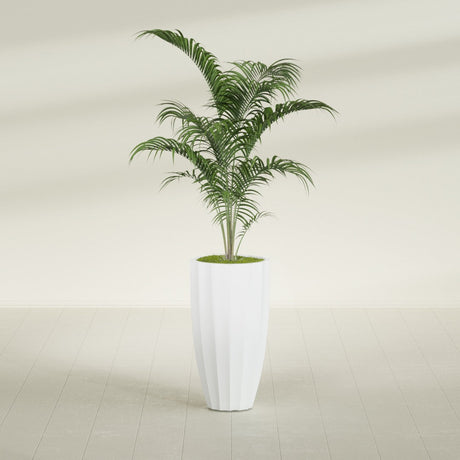 San Jose Tall Fluted fiberglass planter in Matte Bright White, shown planted, in a sunlit interior