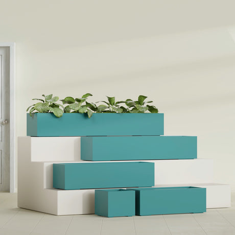 Cuba Corner fiberglass planter in Satin Seafoam Green, size range, in a sunlit interior