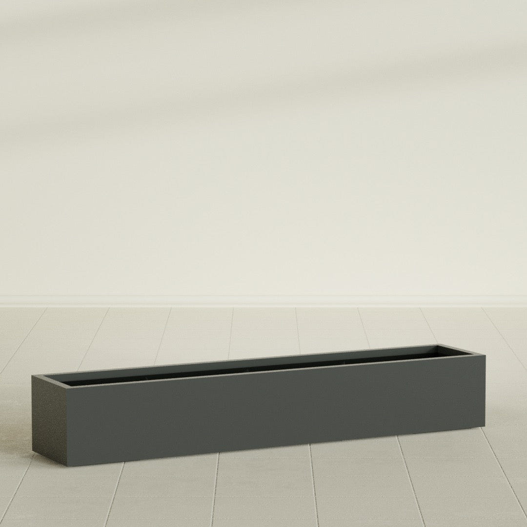 Cuba Low Rectangular Planter in Matte Charcoal, 72"L × 14"D × 12"H, shown empty
