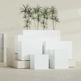 Brisbane Rectangular fiberglass planter in Gloss Bright White, size range, in a sunlit interior