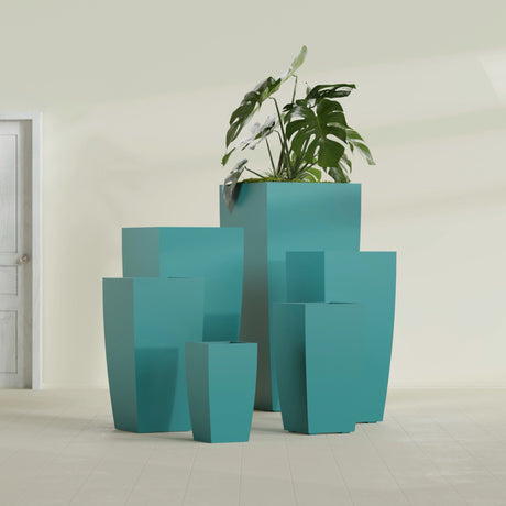 Toulan Tapered Square fiberglass planter in Satin Seafoam Green, size range, in a sunlit interior