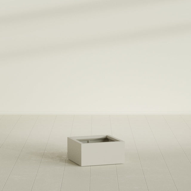 Antwerp corner fiberglass planter in Matte Cement Grey (shown in Satin Beige; color approximate)