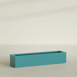 Cuba Low Rectangular Planter in Satin Seafoam Green, 60"L × 14"D × 12"H, shown empty