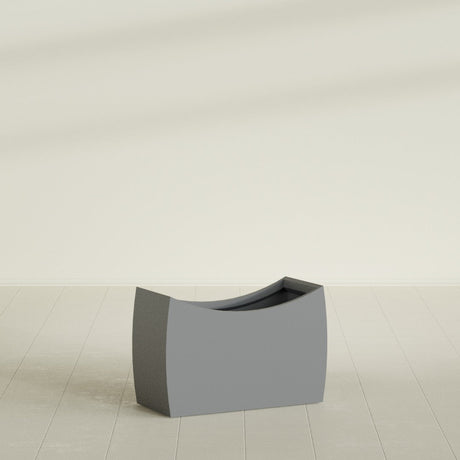Seoul Curved Planter in Matte Gunmetal, 36"L × 16"D × 24"H, shown empty