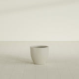 Wannsee Round Planter in Satin Beige, 22"D × 19"H, shown empty