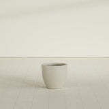 Wannsee Round Planter in Satin Beige, 22"D × 19"H, shown empty