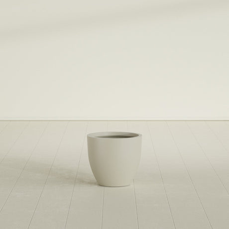 Wannsee Round Planter in Satin Beige, 22"D × 19"H, shown empty