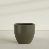 Wannsee Round Planter in Matte Bronze, 50"D × 44"H, shown empty