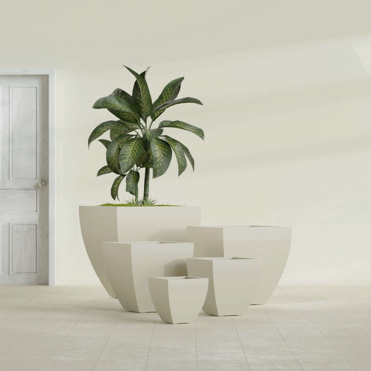 Lima Tapered Square fiberglass planter in Satin Beige, size range, in a sunlit interior