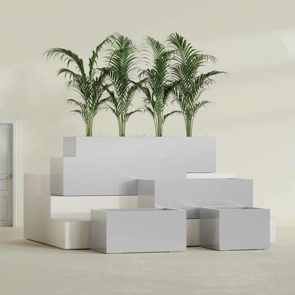 Torino Wide Rectangular fiberglass planter in Metallic Silver, size range, in a sunlit interior