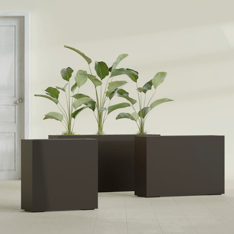 Milano Narrow Rectangular fiberglass planter in Matte Dark Brown, shown planted, in a sunlit interior