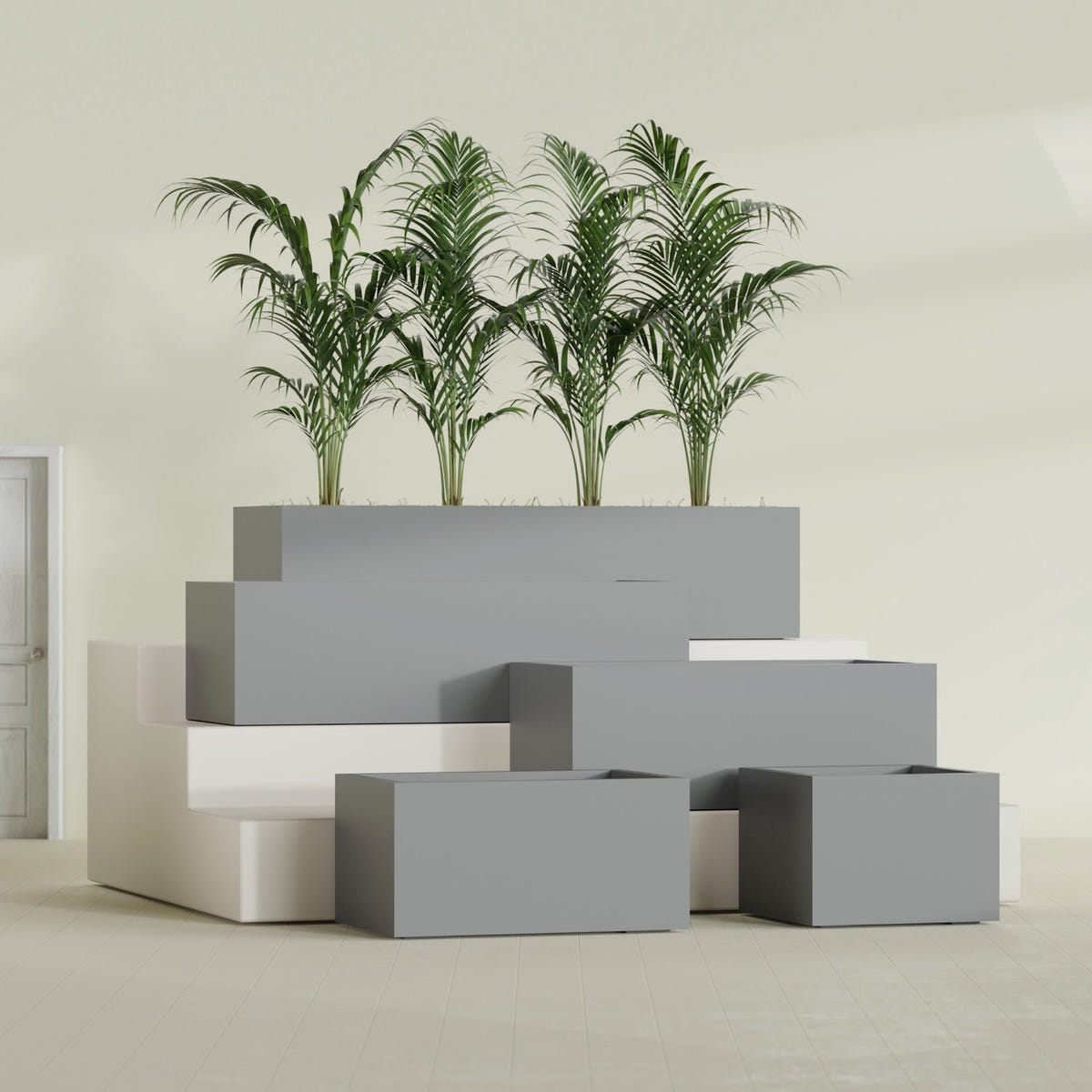 Torino Wide Rectangular fiberglass planter in Matte Gunmetal, size range, in a sunlit interior
