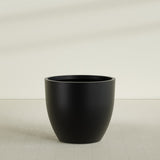 Wannsee Round Planter in Matte Black, 50"D × 44"H, shown empty