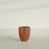 Valencia Tapered Round Planter in Matte Terra Cotta, 15"D × 18"H, shown empty
